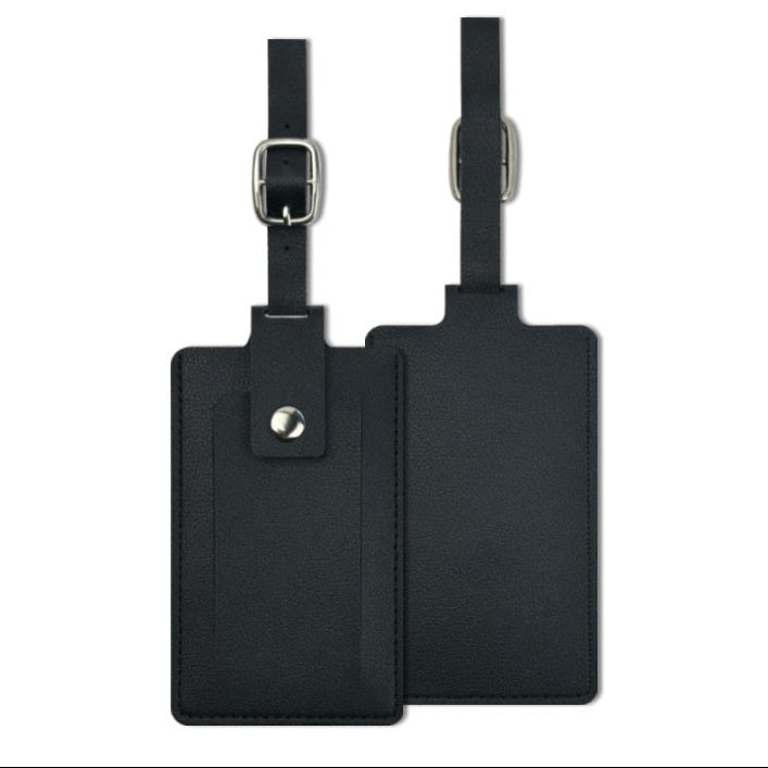 Front and back views of one black PU luggage tag with privacy flap and buckle strap; body 10.7 × 6.6 cm