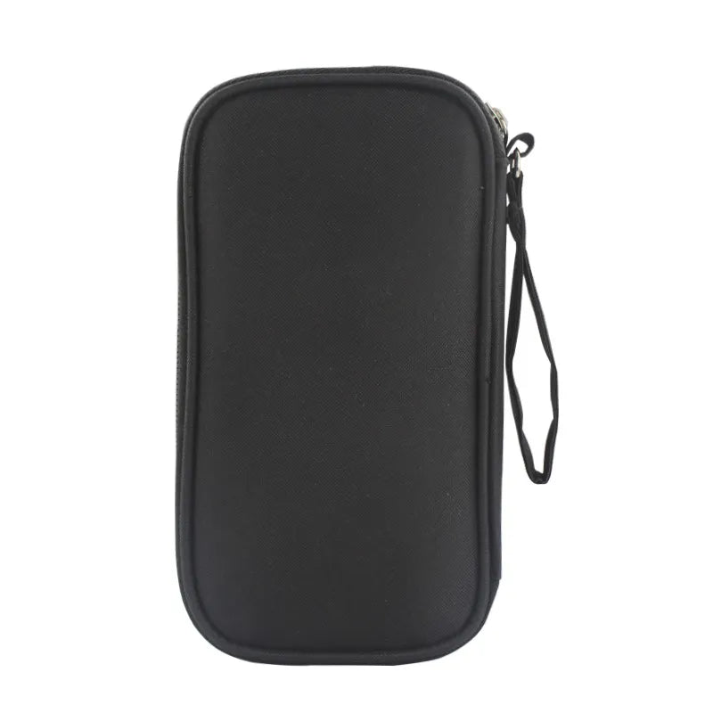 Black travel cable organiser, closed, with zip fastening and wrist strap