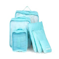 Blue six-piece packing set with three mesh-top zip organisers and three flat zip pouches