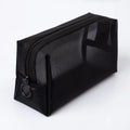 Black rectangular mesh toiletry pouch, closed, with zip fastening and ring pull